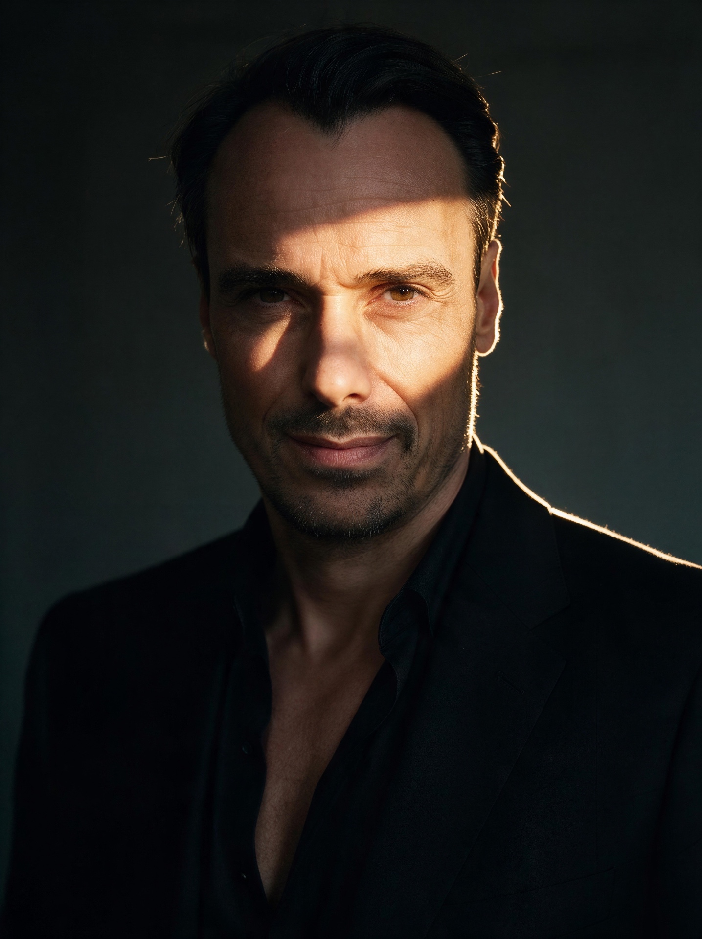 Close-up portrait of Dr. Christoph Lymbersky in a dark jacket